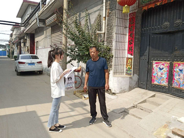 f0c340de419c42abbe8ab5865e50987f.jpg 队友采访亢家庄村居民_副本.jpg